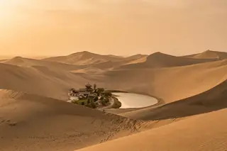 Dunhuang, China — the crescent-shaped Crescent Lake oasis amid the Mingsha singing sand dunes