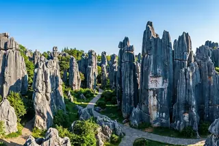 Kunming, China — the sword-shaped grey limestone pillars of the Stone Forest (Shilin)