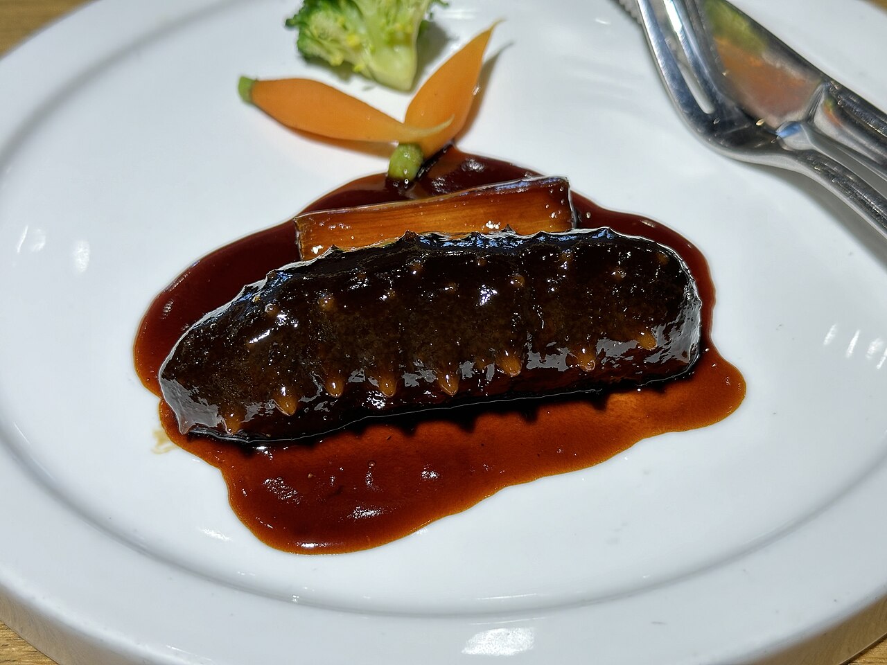 Braised sea cucumber with scallion