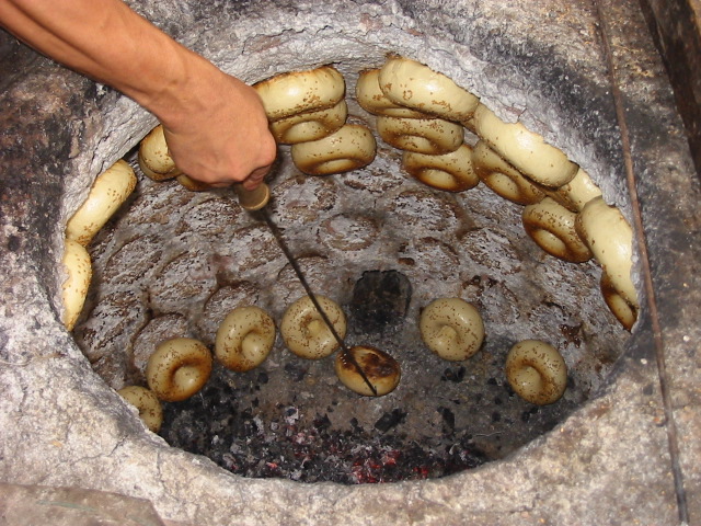 Xinjiang naan baked in a tandoor