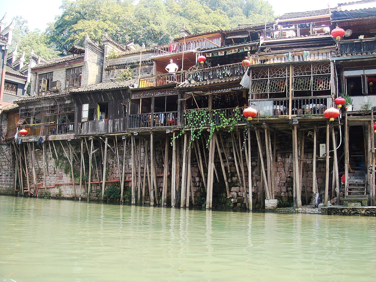 Xiangxi — Fenghuang ancient town stilt houses on the Tuo River