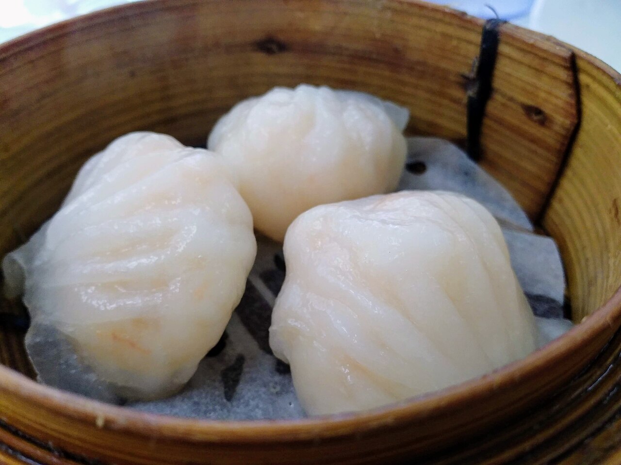 Cantonese dim sum in a bamboo steamer